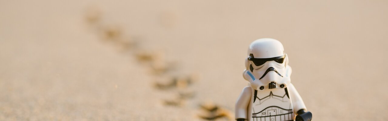 Lego Stormtrooper lost in the desert.